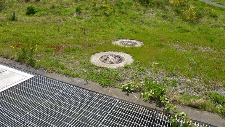 Manholes and grates cover underground water flow