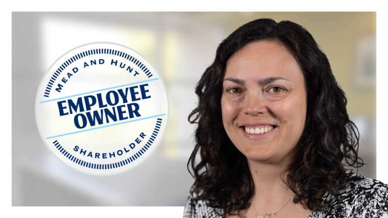 Headshot of Kate Andrus and employee ownership badge