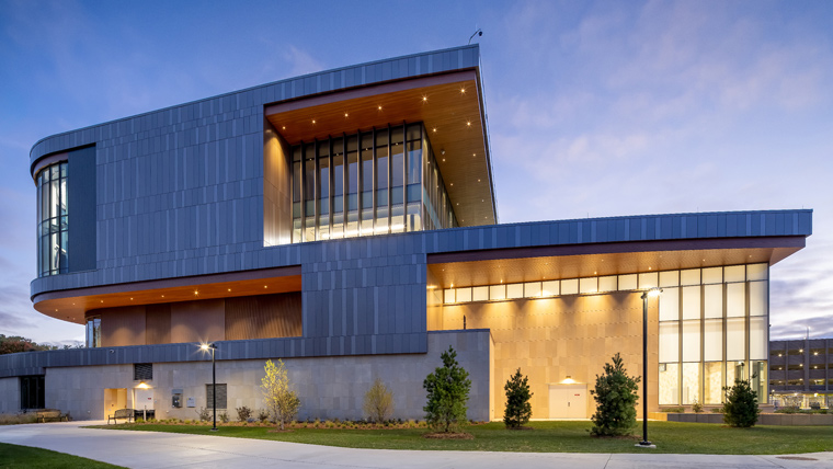 Exterior of Bakke in evening with warm lighting and glow