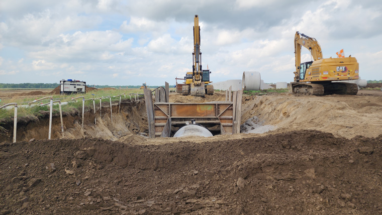construction equipment digging up dirt