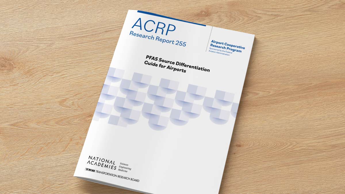 the acrp report on a wooden desk