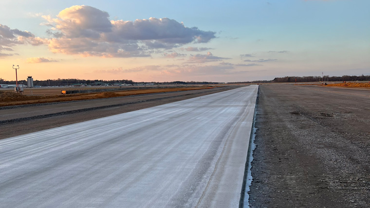 View looking down a road with skyline in the background