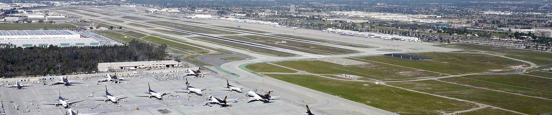Overhead view of airport with planes on runways