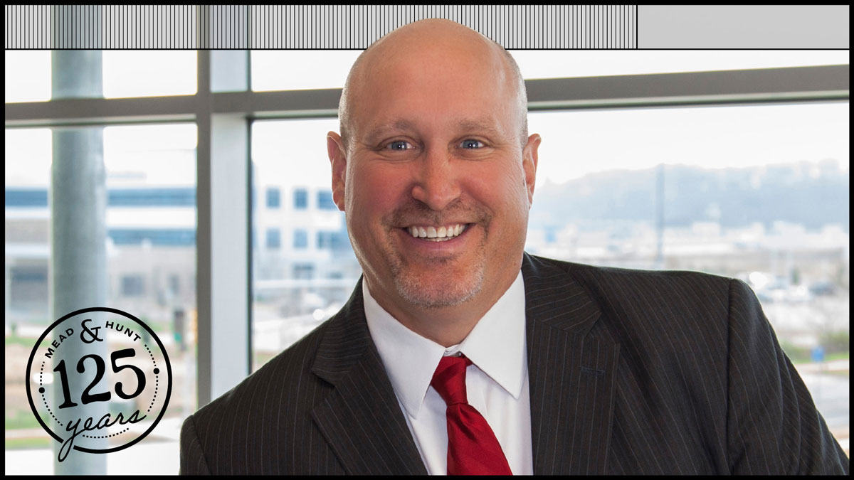 headshot of John Rathke
