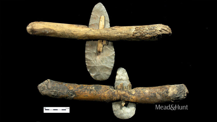 Stone tool, also known as a biface, attached to a wooden handle