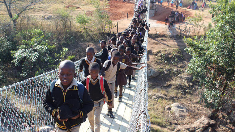 Children crossing bridge