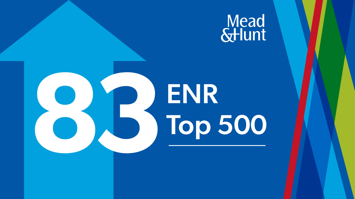 An arrow points up with text that says 83 ENR Top 500 and the Mead & Hunt logo