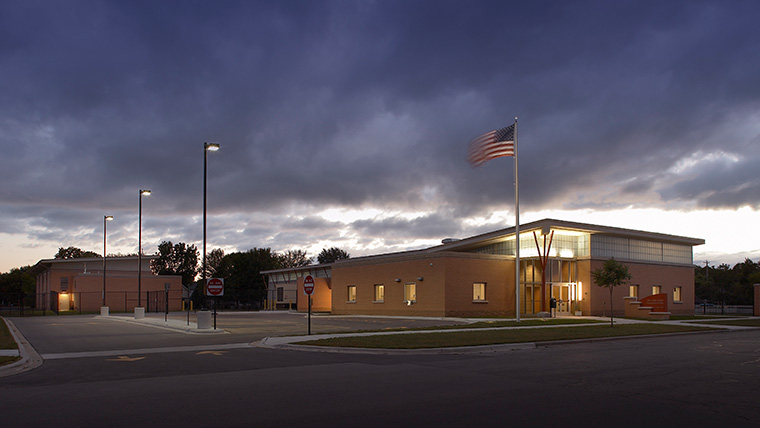 Marinette Water Treatment Facility exterior at night