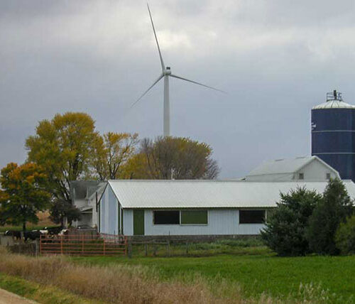 Wind farm with turbine in background