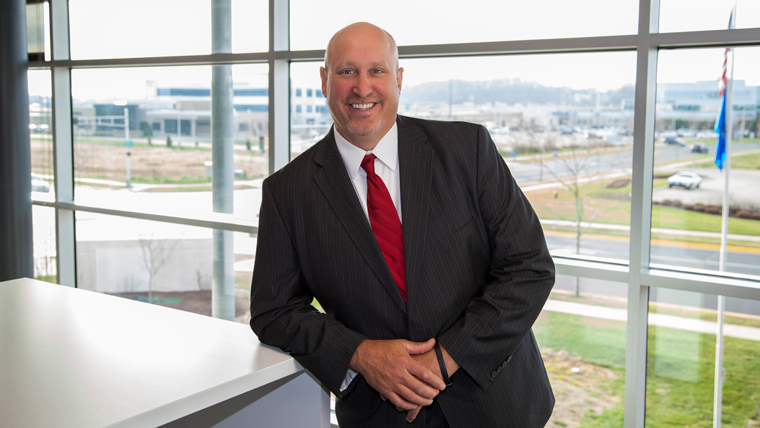 headshot of John Rathke