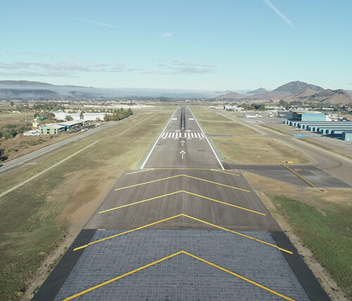 aerial view of runway spanning vertically