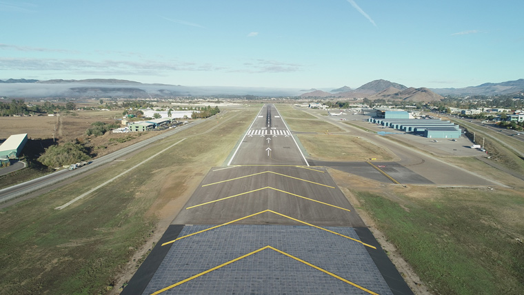 aerial view of runway spanning vertically