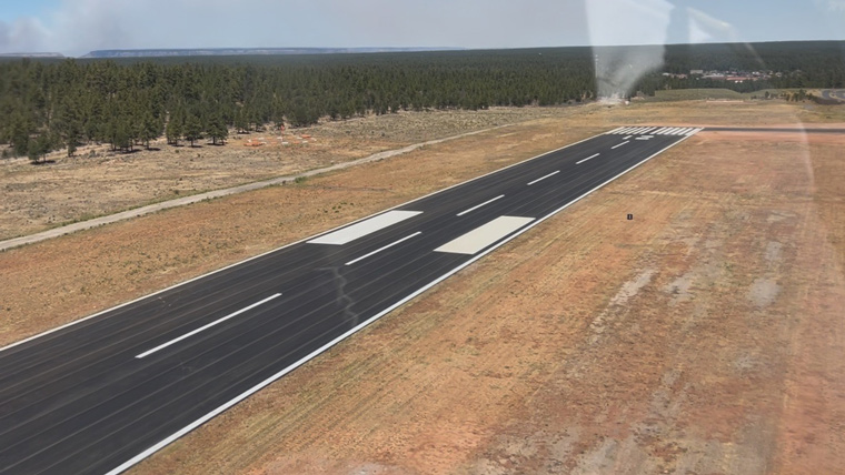 Aerial shot of newly paved airport runway