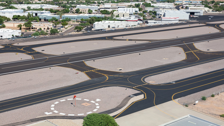 airport runway with taxiways on either side