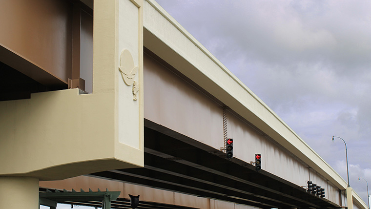 Sideview of Backgate Bridge with decorative logo embedded