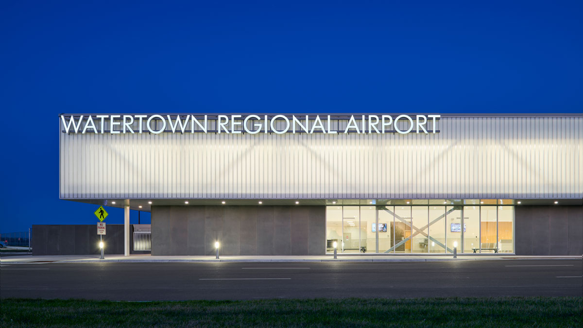 exterior of ATY terminal shows large letters that say "Watertown Regional Airport"