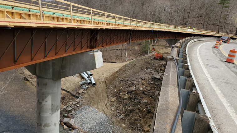 view down the side of the bridge showing construction