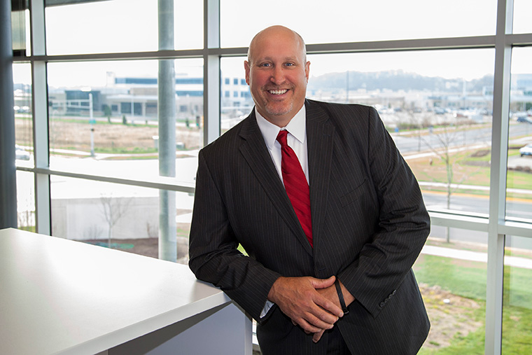 headshot of John Rathke