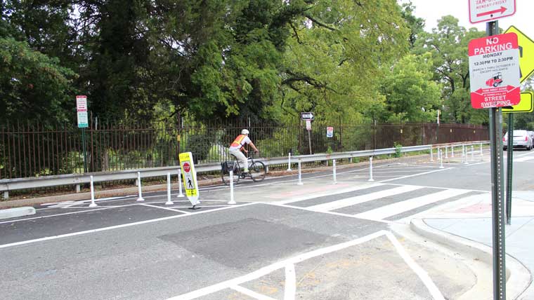 a cyclist is using the bike lane